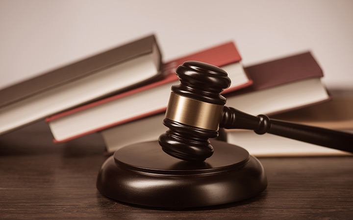 a young child exhibiting challenging behavior towards an education provider