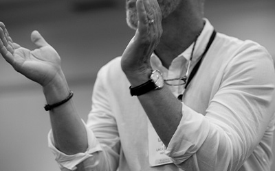 man celebrating with his hands